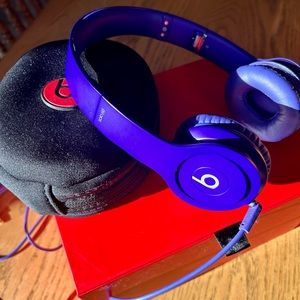 Beats by Dr. Dre - wired. Purple. W/ headphone case & original packaging.